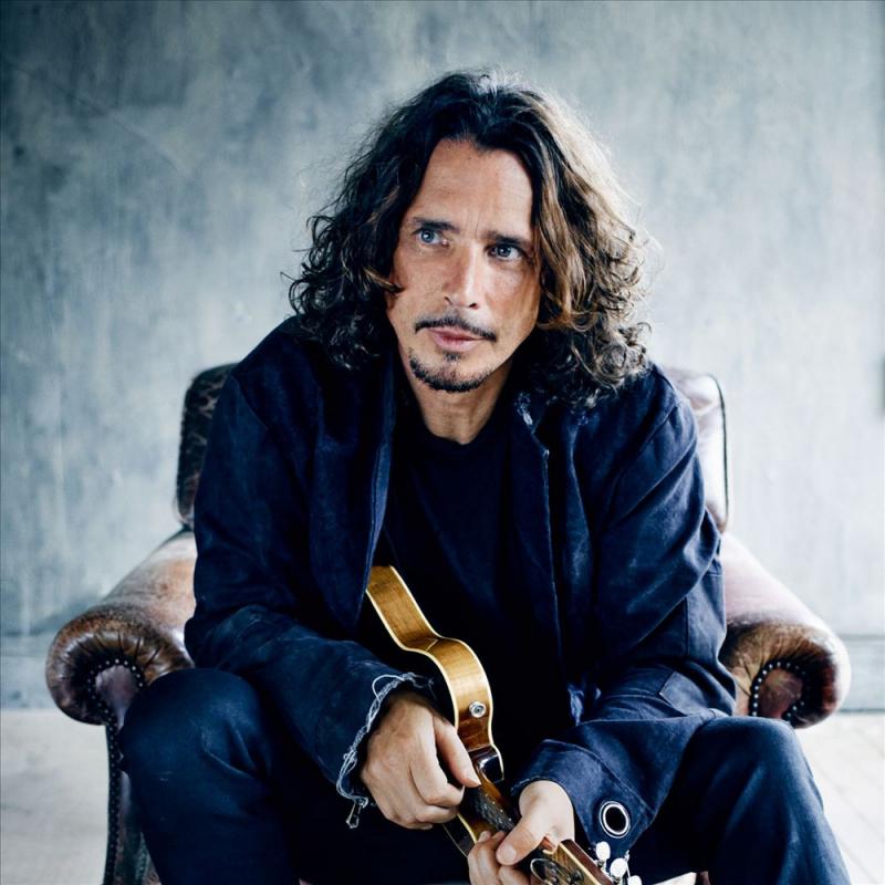 Chris Cornell holding Mandolin