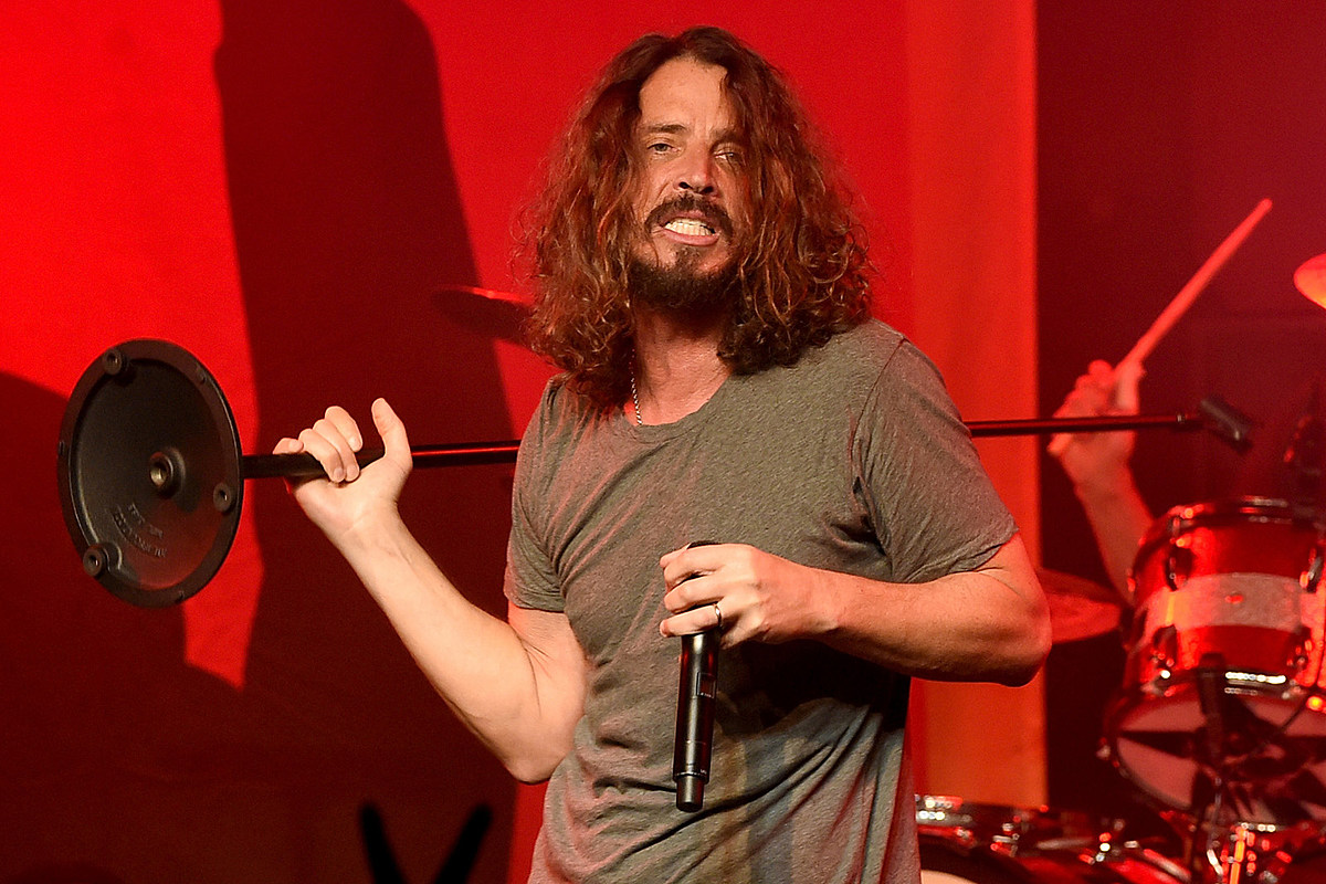 Chris Cornell holding mic stand